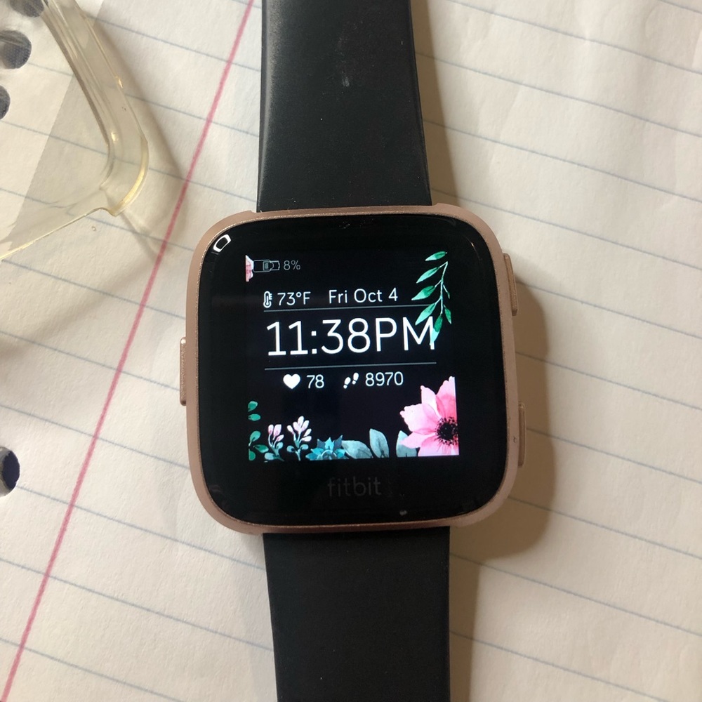 Rose gold Fitbit versa like new condition